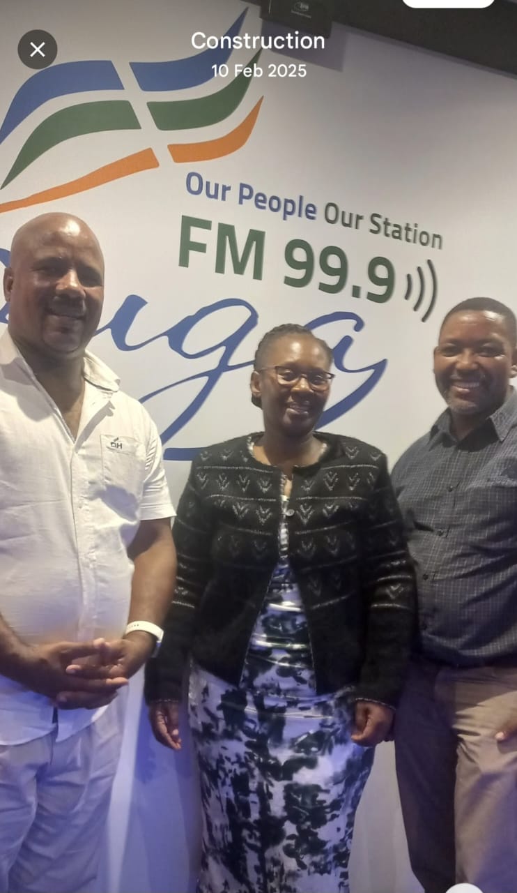 Guests at the Kouga FM 99.9 branded wall