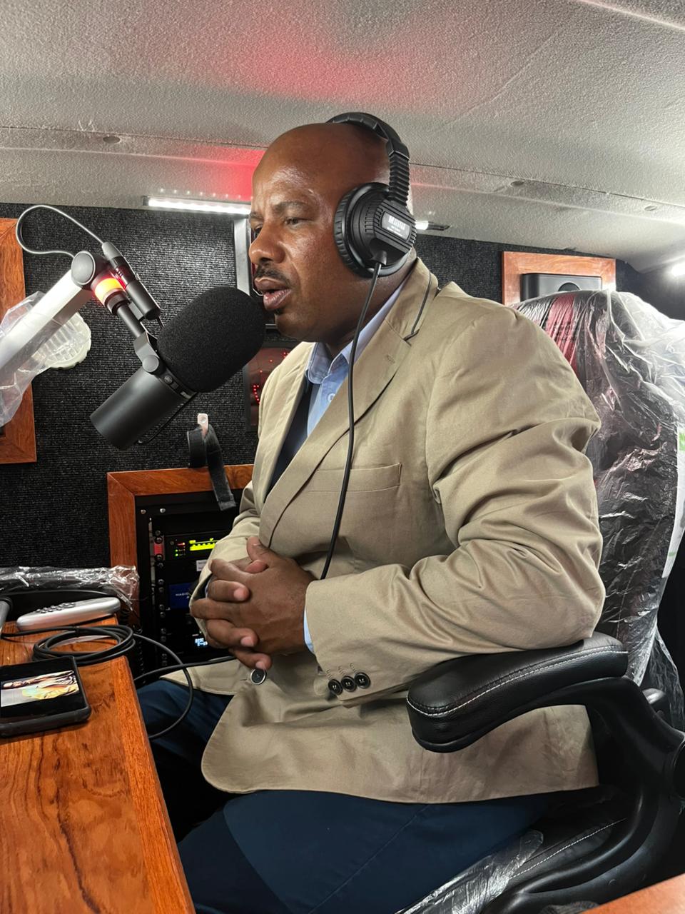 Guest presenter on air inside the Kouga FM mobile studio