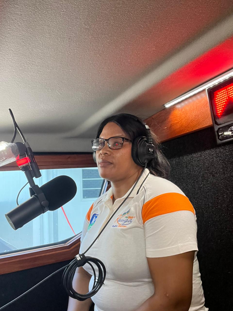 Kouga FM presenter live on air with the red on-air light