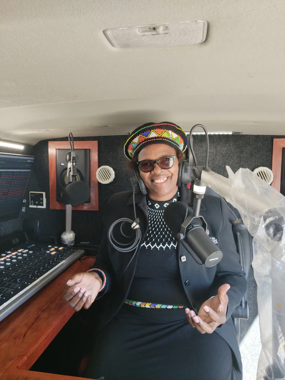 Kouga FM presenter behind the mixing desk