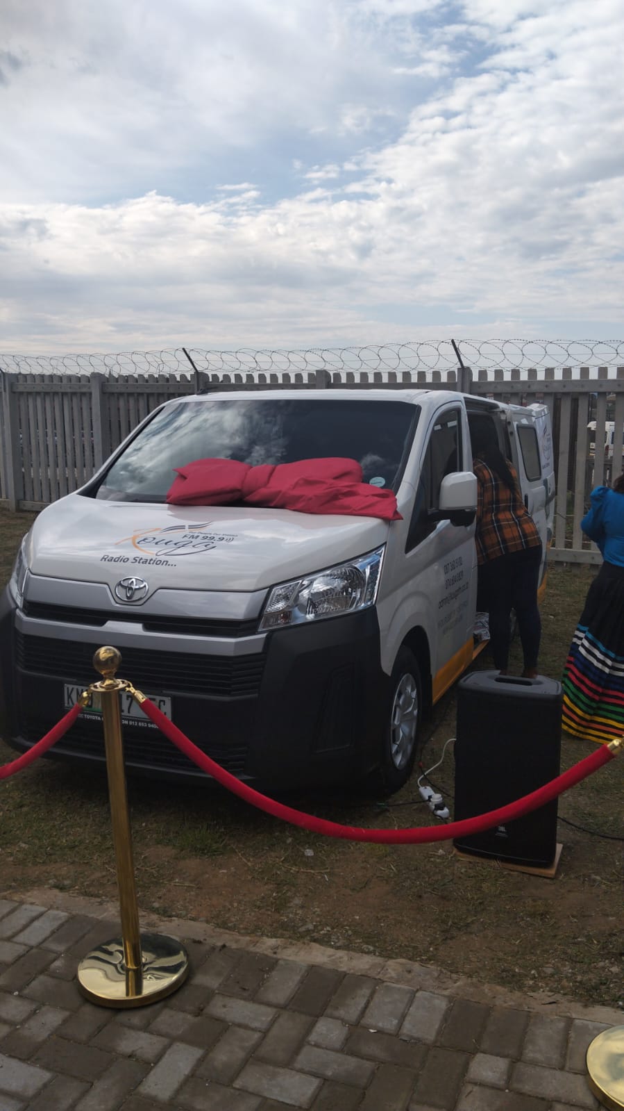 Kouga FM branded van unveiled with red ribbon at launch
